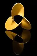 Mathematical surface in which the boundary is the trefoil knot in different angles
